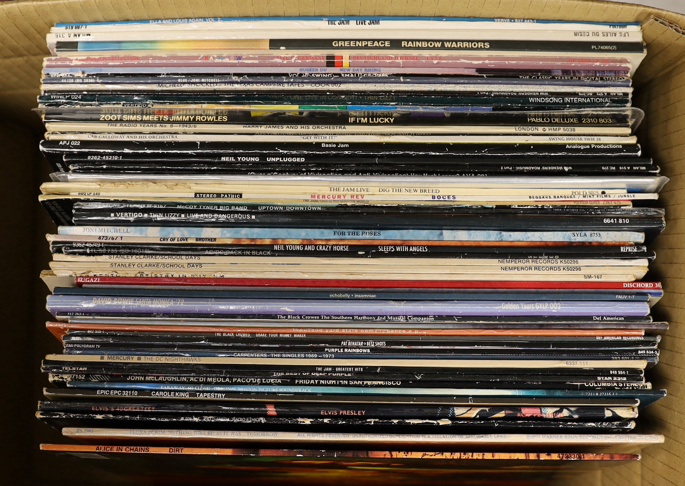 Fifty-five mainly 80's and 90's LPs, including, The Jam, Joan Armatrading, Neil Young, Mercury Rev, Thin Lizzy, Joni Mitchell, AC/DC, David Bowie, The Carpenters, Alice In Chains, etc